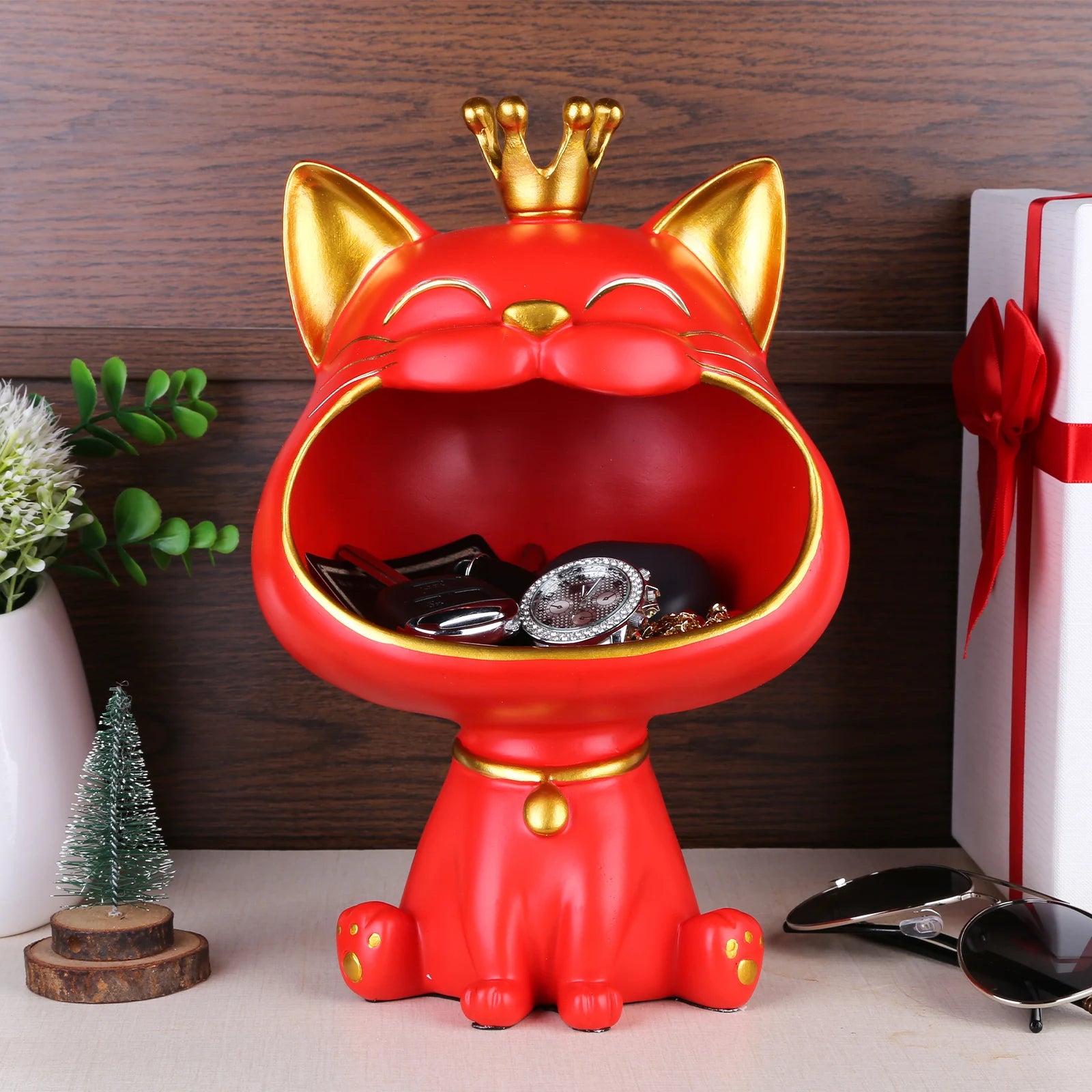Lucky Cat Figurine with Storage Box – Resin Laughing Cat Home Decor Red cat-shaped jewelry holder with gold crown on a wooden surface.