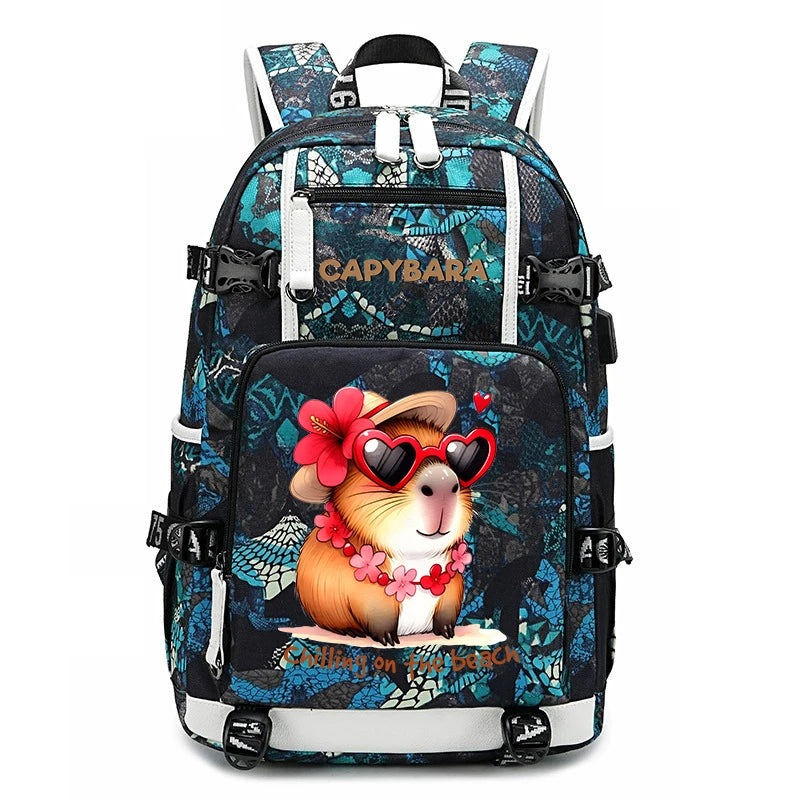 Capybara Backpack – Large Capacity Lightweight School Bag A backpack with a black and teal tropical pattern, featuring a cartoon guinea pig wearing red heart-shaped sunglasses and a flower crown on the front pocket. The brand name 'CadyBara' is printed in gold on the upper front.