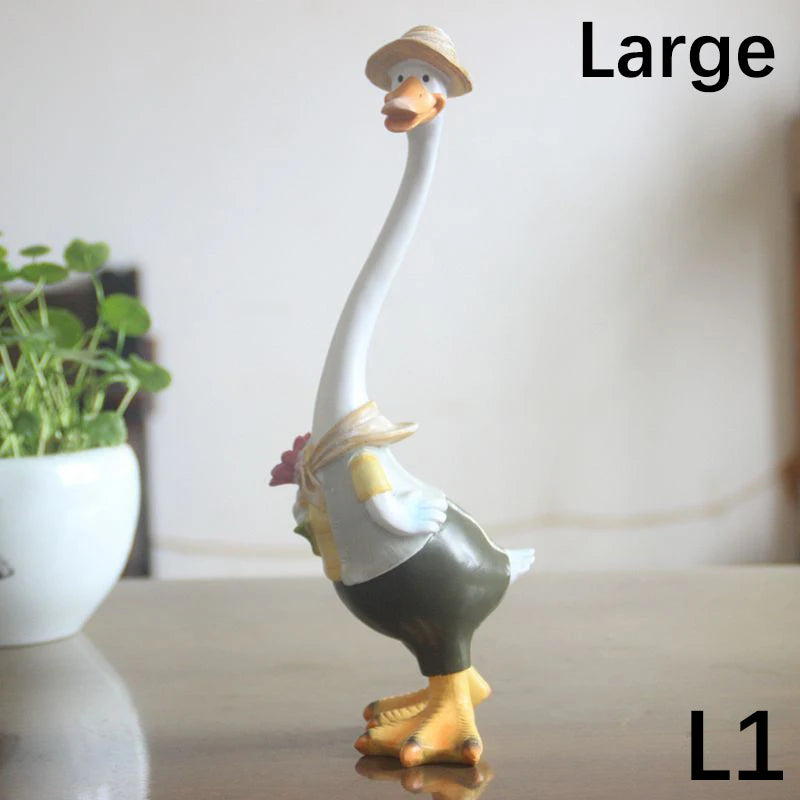 Resin Duck Family Garden Statue – Animal Outdoor Decor Sculpture Large goose figurine with a hat on a reflective surface, with 'Large' and 'L1' text.