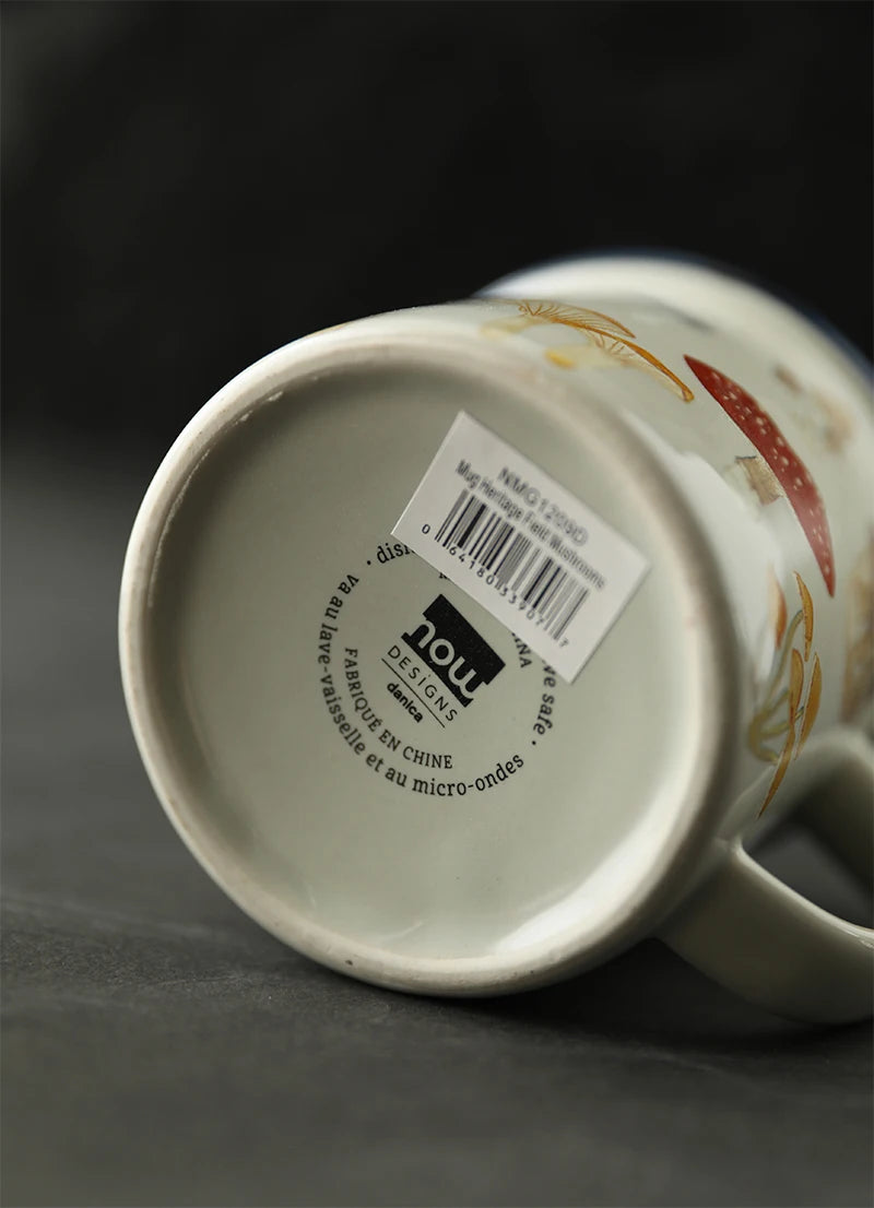 Mushroom Ceramic Coffee Cup – Japanese Cartoon Style Mug with a brand label on a dark background