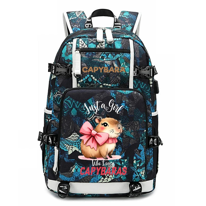 Capybara Backpack – Large Capacity Lightweight School Bag A backpack with a black and teal patterned design, featuring a cartoon hamster wearing a pink bow on the front pocket with the text 'Just a Girl Who Likes CAPYBARAS'.