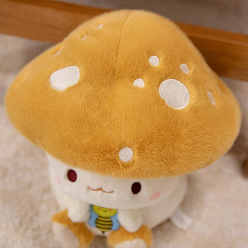 Creative Mushroom Plush Pillow – Cute Stuffed Plant Cushion for Home Décor Plush toy resembling a cartoon character with a mushroom hat on a soft surface