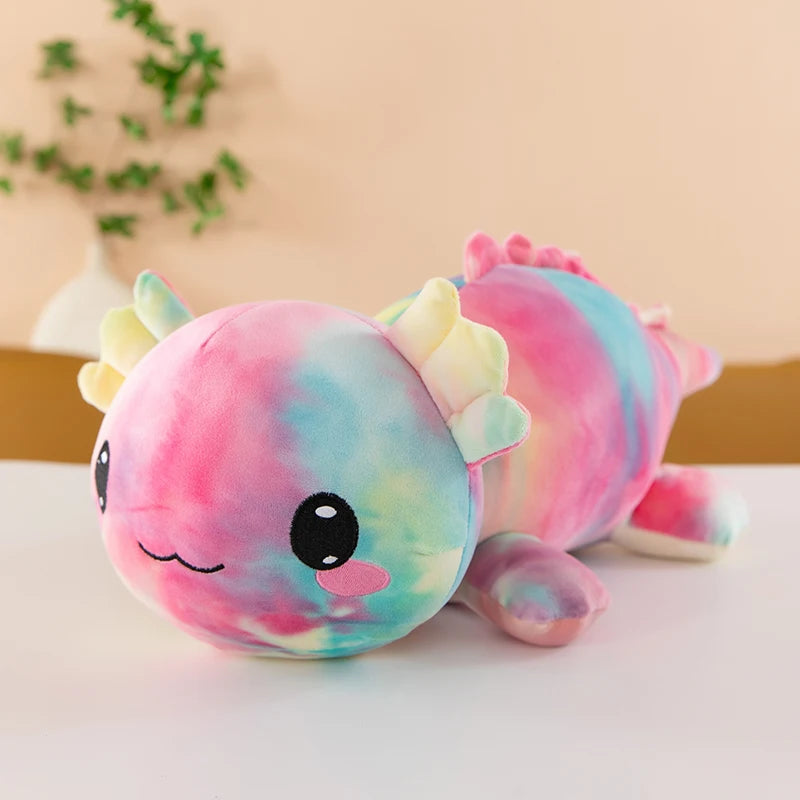 Axolotl Squishmallow Plush – Stuffed Animal Toy Colorful tie-dye plush toy with a smiling face on a light surface.