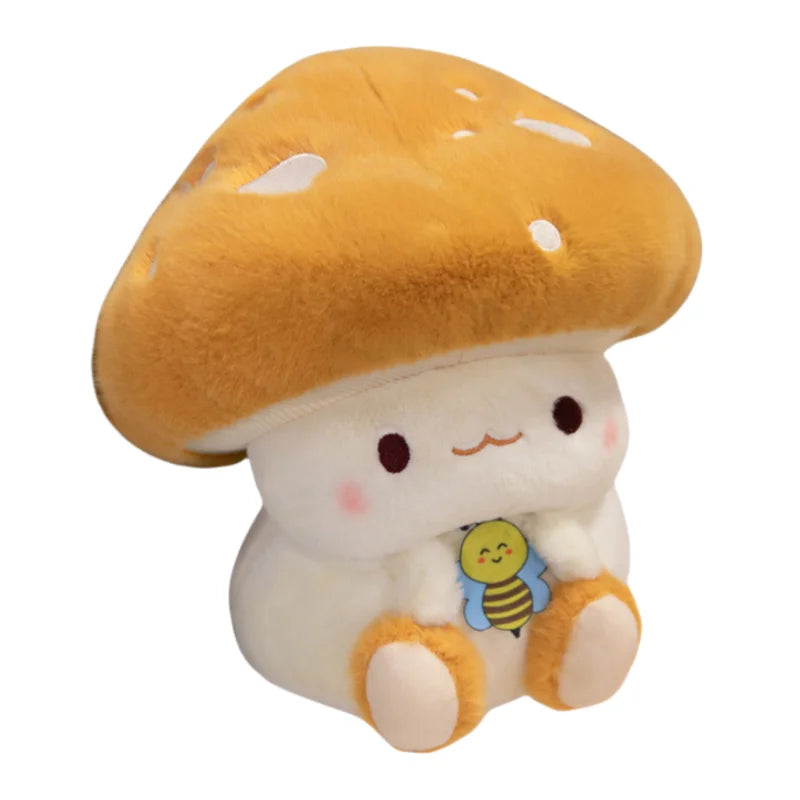 Creative Mushroom Plush Pillow – Cute Stuffed Plant Cushion for Home Décor Plush toy shaped like a mushroom with a cute face and small bee attached, on a white background