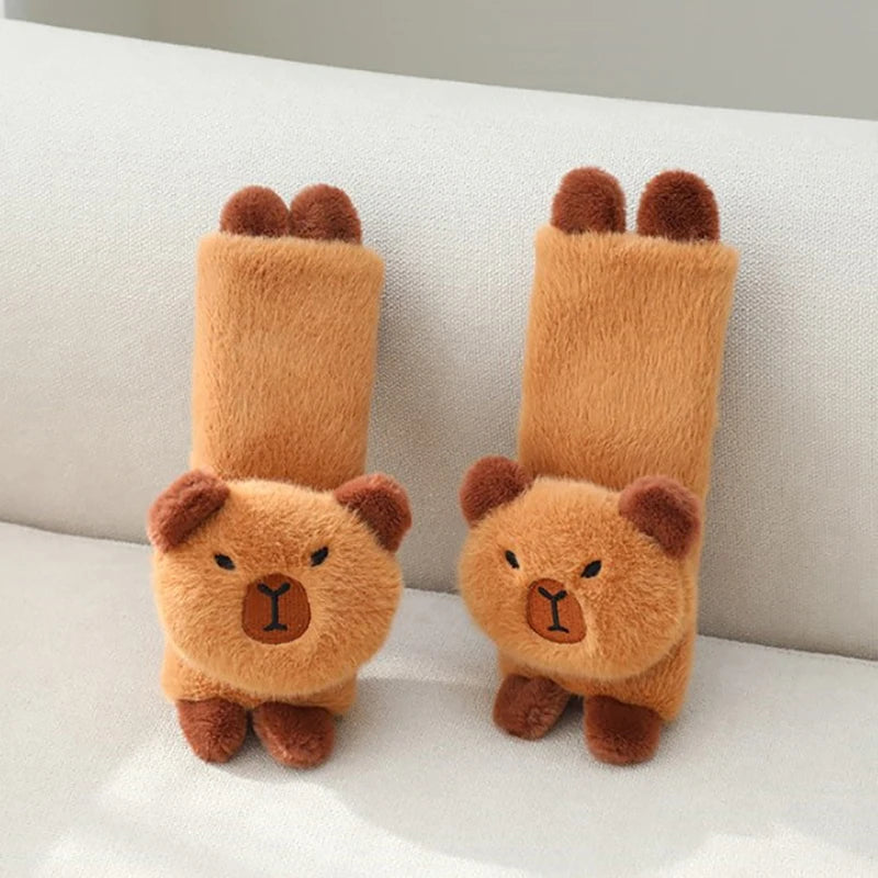 Capybara Car Headrest Neck Pillow & Tissue Holder – Plush Car Decor Two brown bear-shaped slippers on a light-colored surface
