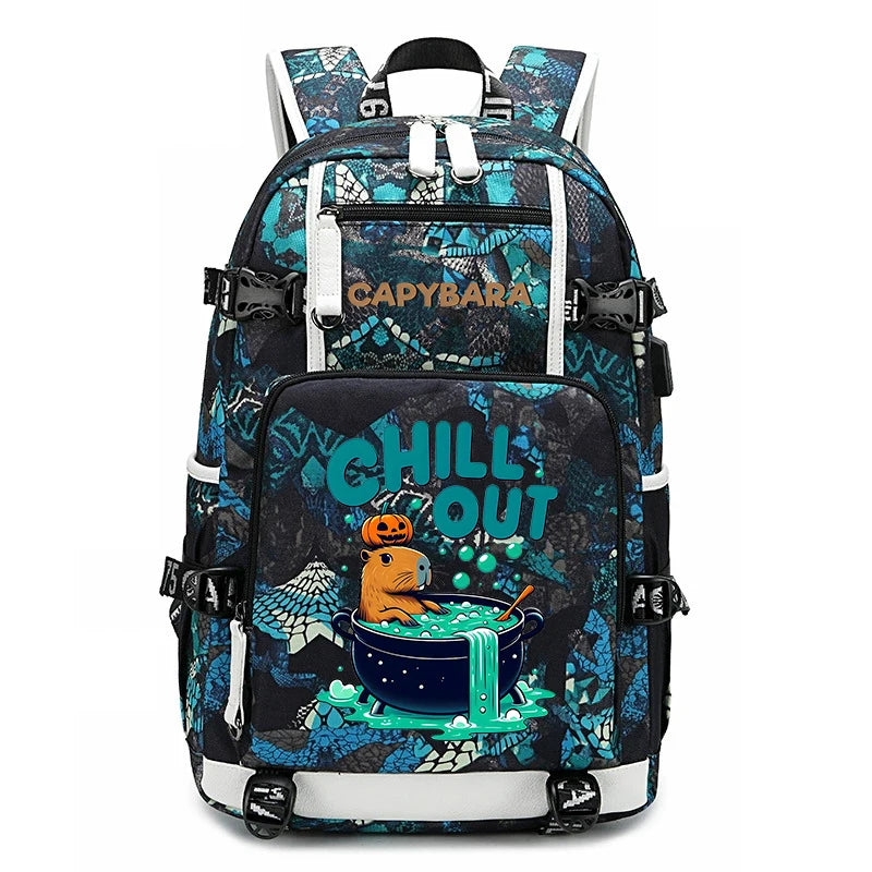 Capybara Backpack – Large Capacity Lightweight School Bag A black and blue patterned backpack with a cartoon graphic of a cat in a potion pot and the text 'CHILL OUT' on the front pocket. The brand name 'CAPYBARA' is printed in gold on the upper front pocket.