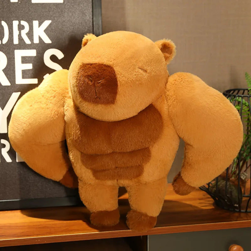 Muscle Capybara Plush Pillow – Funny Brown Stuffed Animal Cushion Plush bear toy with a muscular design on a wooden surface.