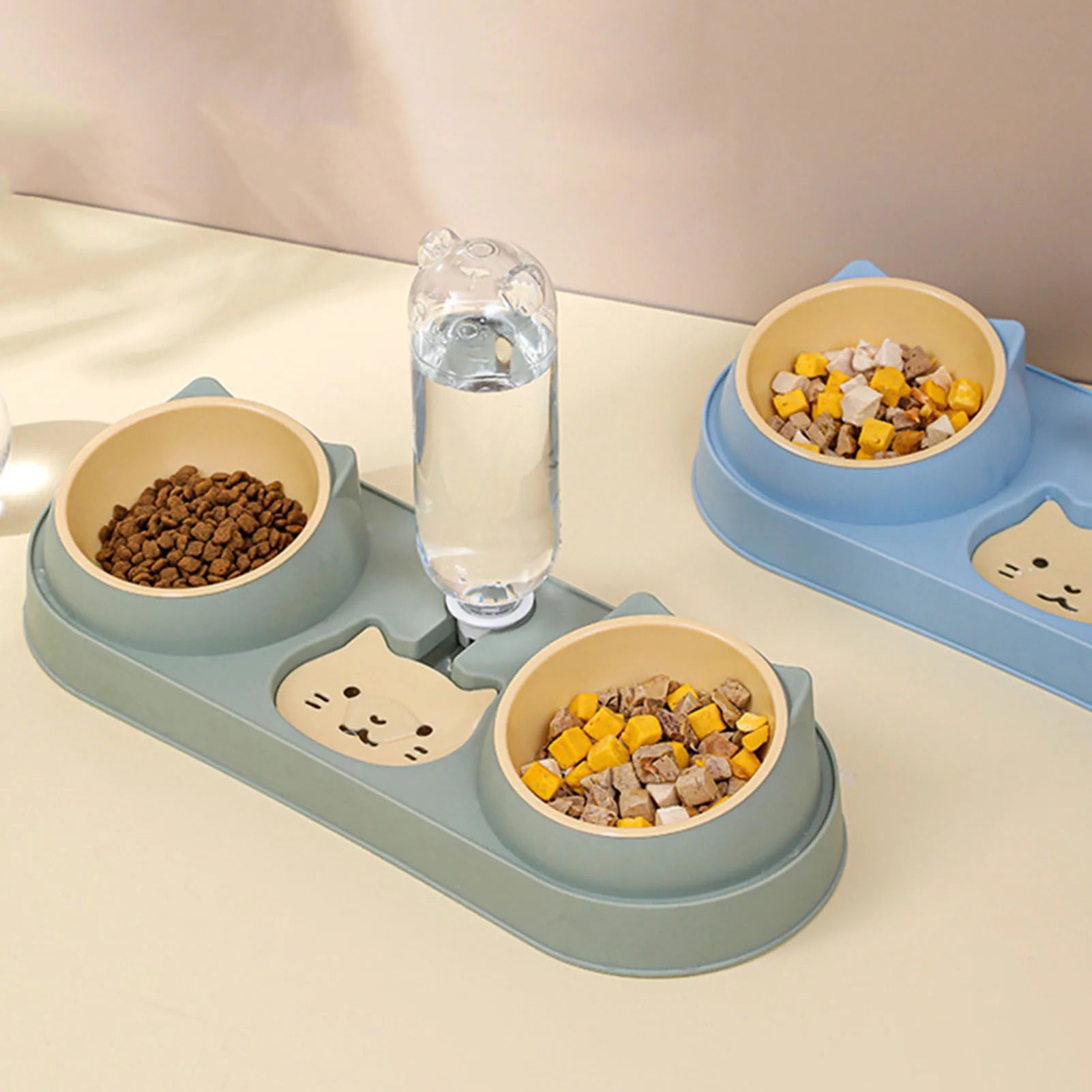 Automatic Pet Feeder Double Bowl with Water Fountain Pet feeding station with two bowls and a water bottle on a light surface.