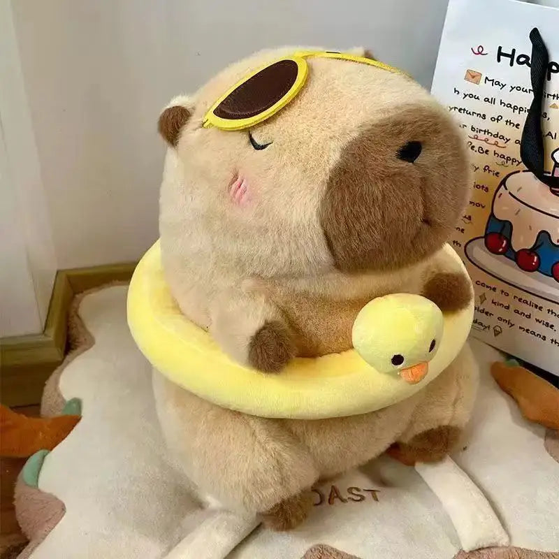 Green Banana Capybara Plush Toy – Cute Kawaii Stuffed Animal Plush toy resembling a dog with sunglasses and a duck on a cushion