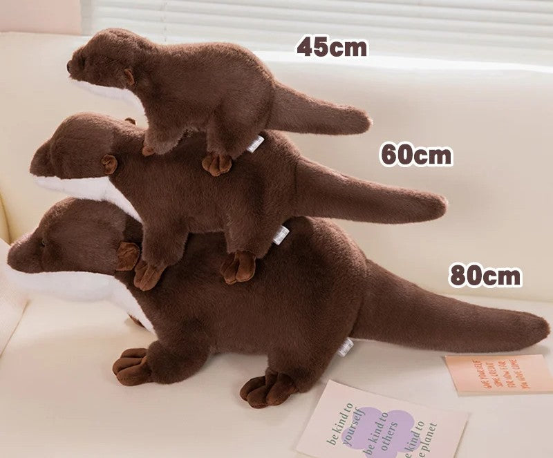 Realistic Otter Plush Toy Three brown plush otters of different sizes stacked on a light background with measurements indicated.