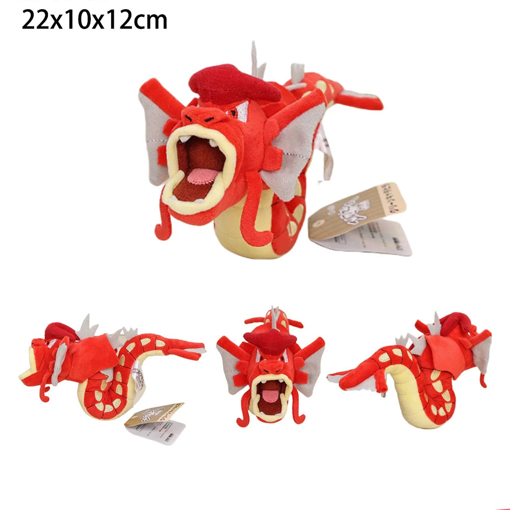 Pokemon Plush Toy – Arceus, Greninja, Haunter, Yveltal & Terapagos Red dragon plush toy with tags on a white background, labeled 'Playtime toy store'.