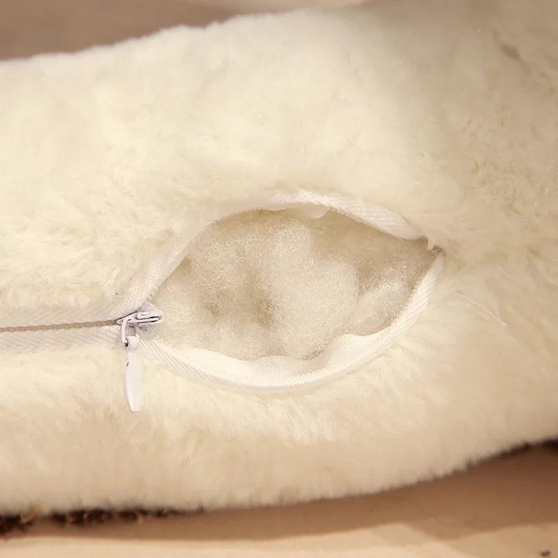 Large Mushroom Plush Pillow – Soft Huggable Stuffed Plant Cushion Close-up of a white pillow with a zipper, showing the interior filling.