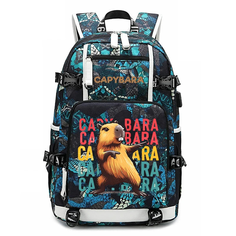 Capybara Backpack – Large Capacity Lightweight School Bag A backpack with a black and teal reptile pattern, featuring a large cartoon capybara on the front pocket with 'Capybara' text in red, yellow, and teal, and the brand name 'Capybara' printed on the upper front.