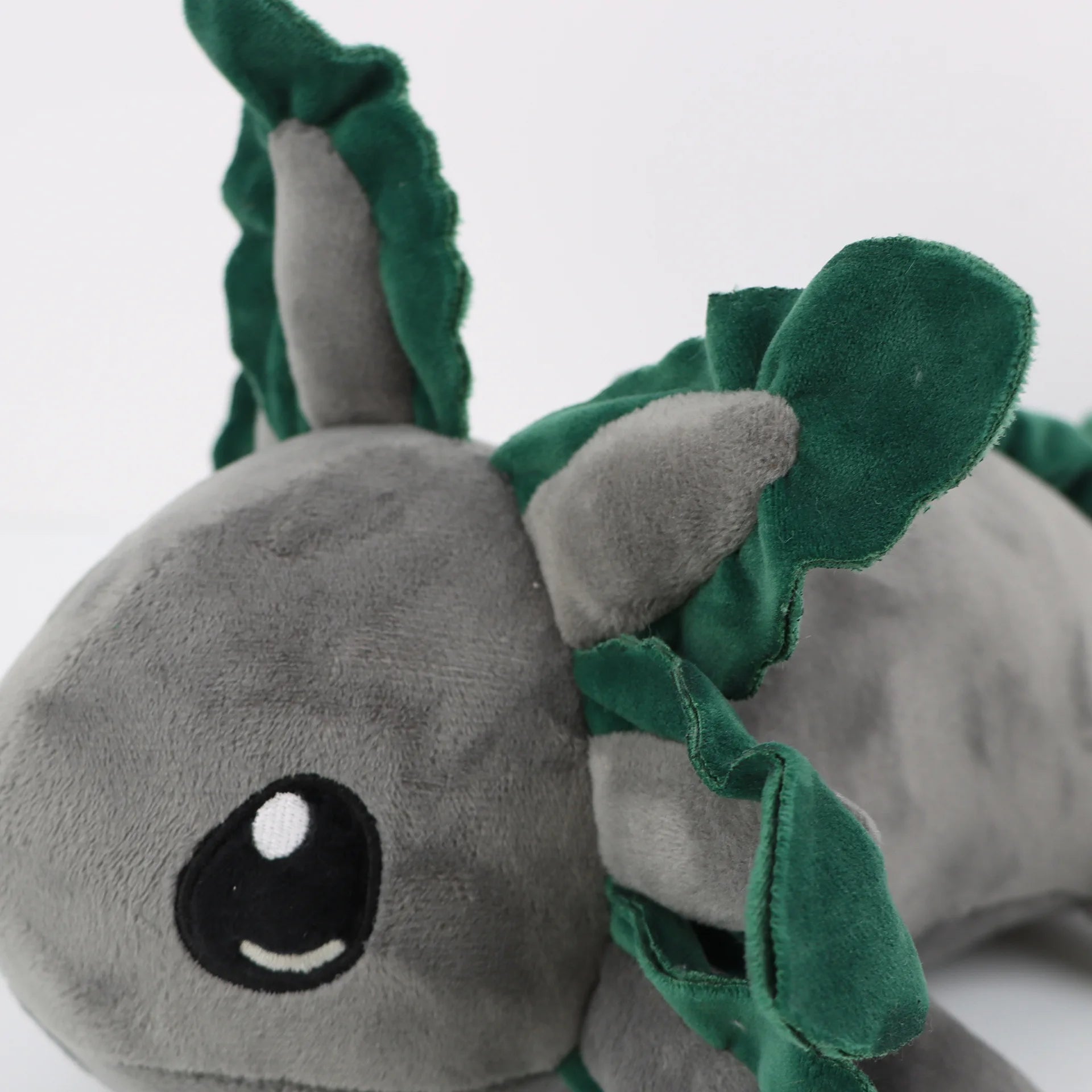 Axolotl Squishmallow Plush Toy – Soft Stuffed Animal Plush toy dragon with green wings on a white background