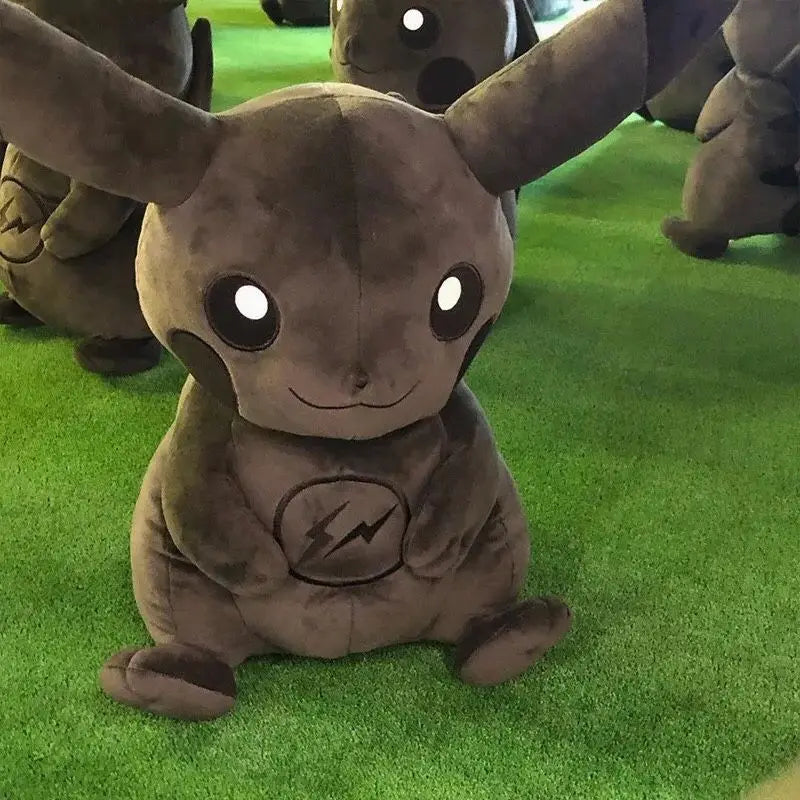 Dark Pikachu Plush Pillow Black Kawaii Doll Plush toy resembling a character with large ears and a lightning bolt symbol on a green surface.