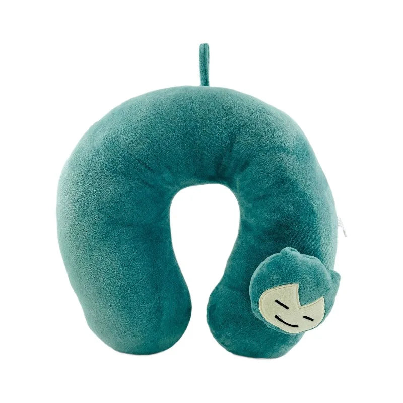 Pokemon Furret, Dratini & Snorlax Plush Neck Pillow A plush U-shaped travel neck pillow in teal, featuring a small embroidered character face on one end and a matching fabric loop at the top, shown on a plain white background.