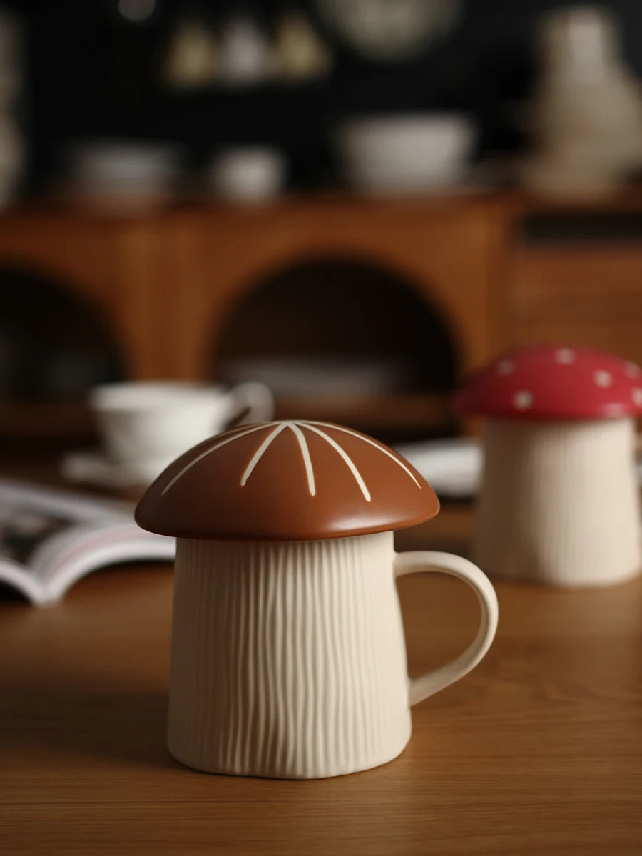 Mushroom Coffee Mug with Lid – Cute Drinking Cup Mushroom-shaped mug with a brown cap on a wooden surface