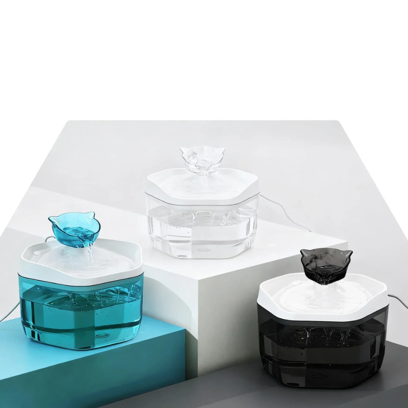Cat Water Fountain 1.2L USB Pet Drinking Fountain Three glass containers with different designs on a white and gray geometric background