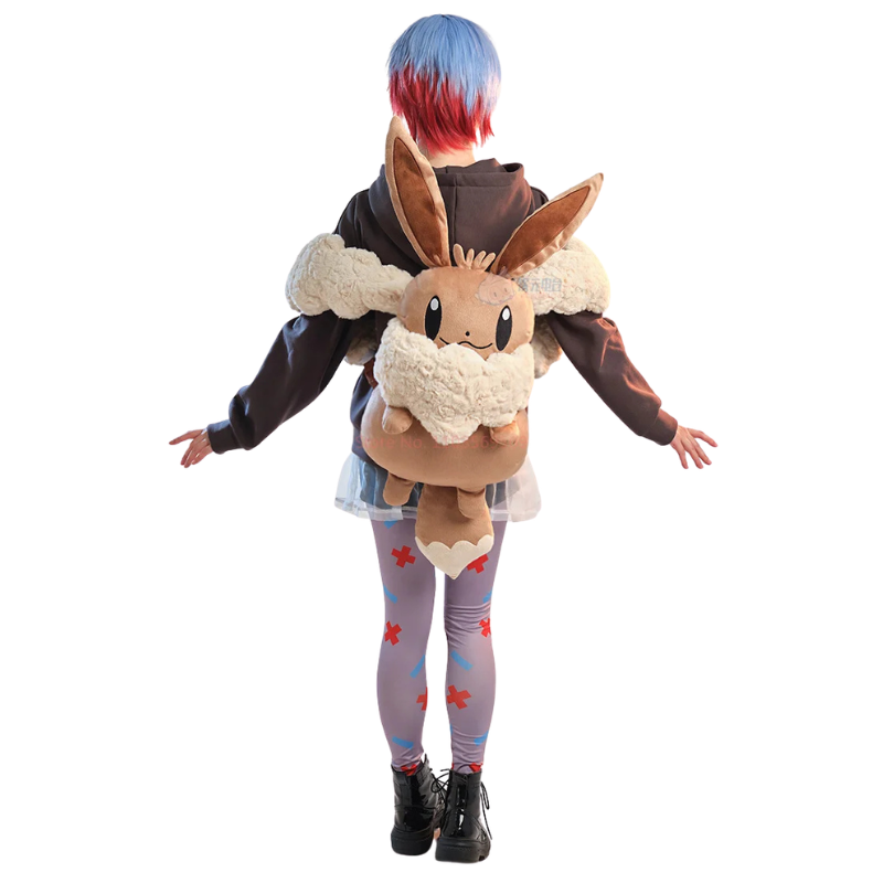 Eevee Plush Backpack – Kawaii Pokemon Cosplay Bag A person shown from behind wearing a large plush Eevee backpack. The person has blue and red hair, wears a dark brown hoodie, a light blue skirt, and patterned leggings, set against a solid white background.