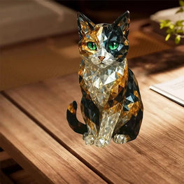 Crystal cat figurine on a wooden surface