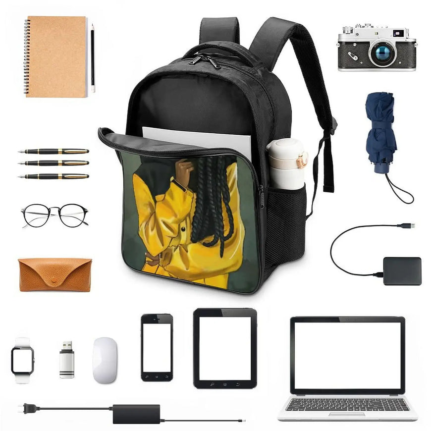 Black backpack with yellow graphic surrounded by various items on a white background