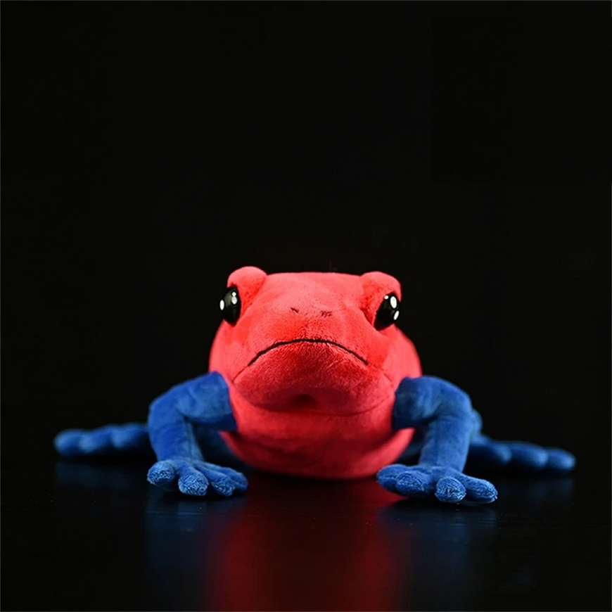 Red and blue plush toy on a black background