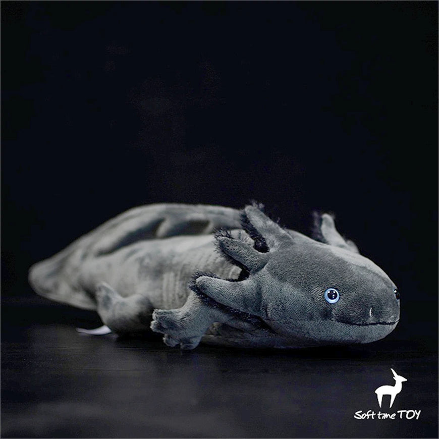 Plush toy axolotl on a black background with 'Soft Time Toy' logo.