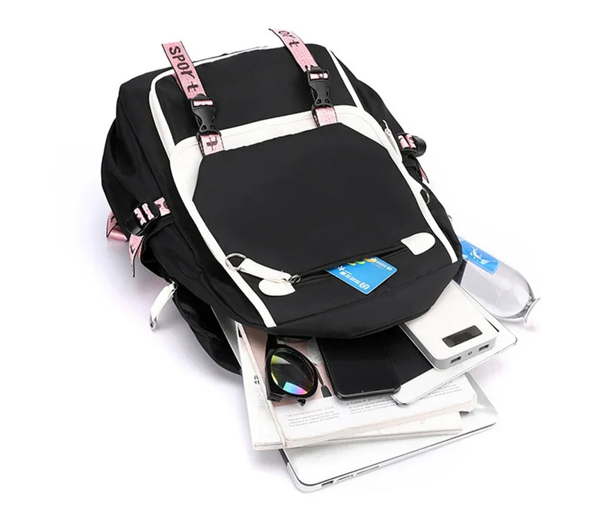 Black backpack with pink straps on a white background