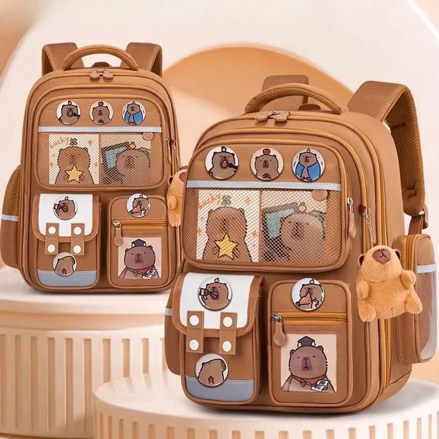Brown backpack with teddy bear designs on a beige background