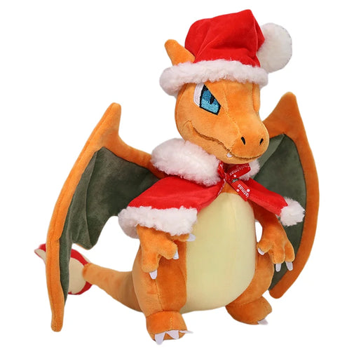 A Charizard plush toy wearing a red Santa hat with white trim and a matching red cape with white faux-fur trim, shown on a plain white background.