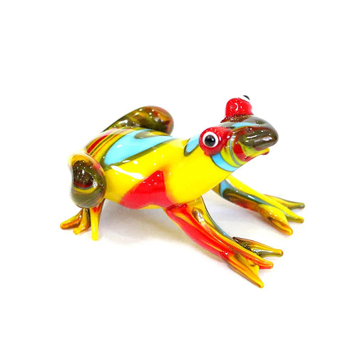 Colorful glass frog figurine on a white background
