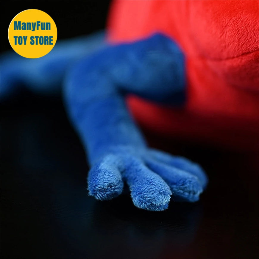 Close-up of a blue plush toy leg with a red plush toy body